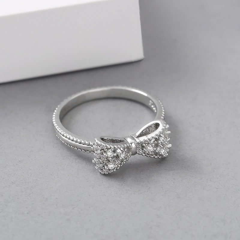 Silver Bow with White Zircon Ring